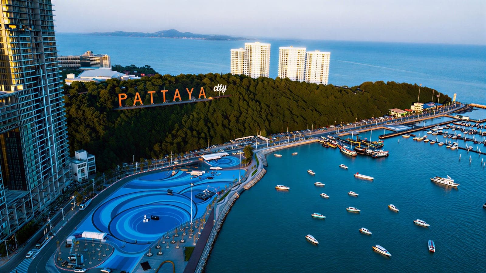 Pattaya city and the bay from above, with the marina and the boats to Koh Larn
