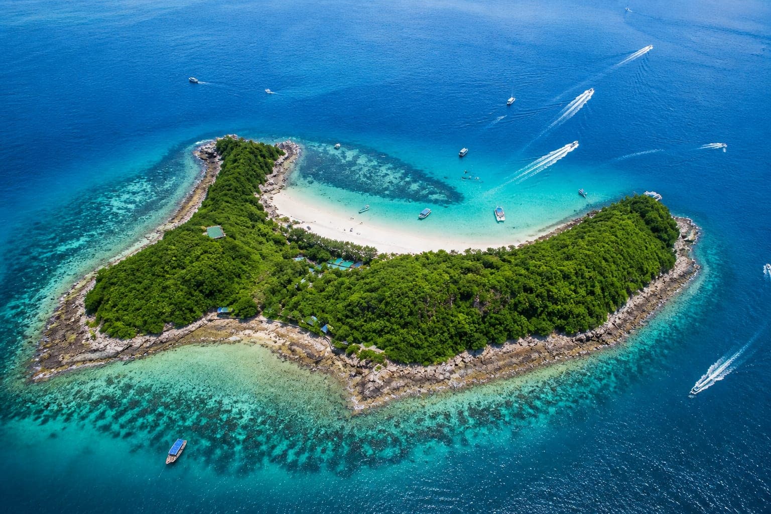 Aerial view of Coral Island, Koh Larn, and its turquoise reef off Pattaya
